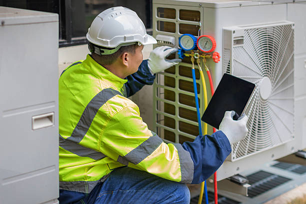 Professional Hvac Installation technician working in Urbana, IA